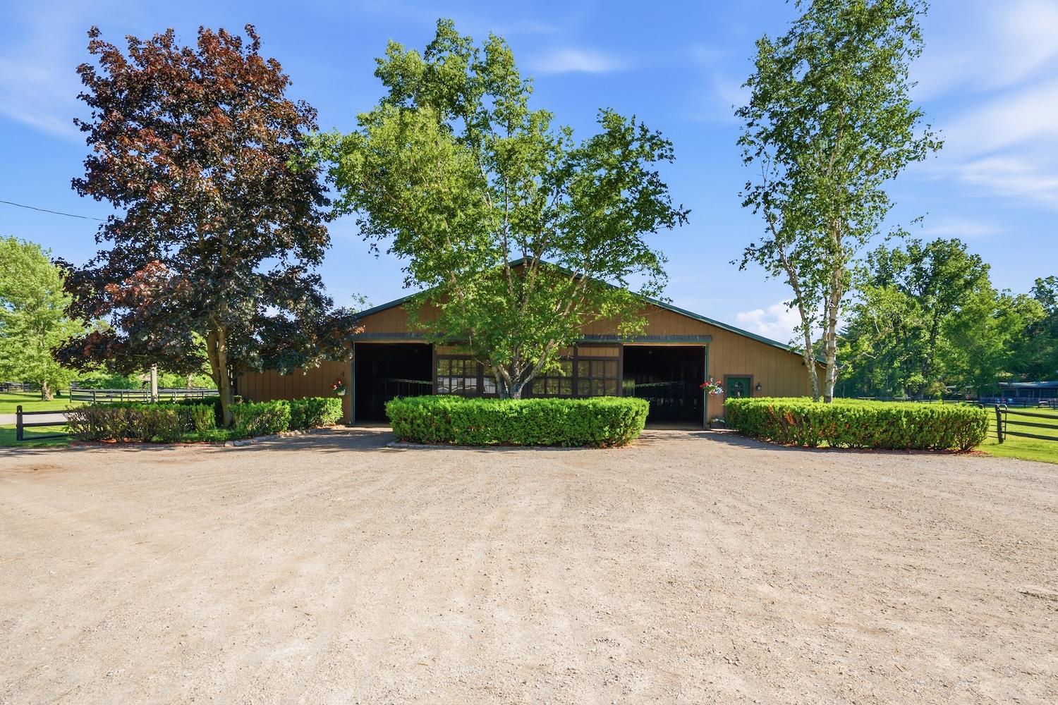 Horse barn with gravel drive in St. Clair County
